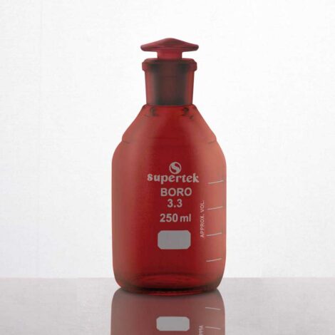 bottle, reagent, heavy duty, graduated with interchangeable glass stopper, narrow mouth, amber